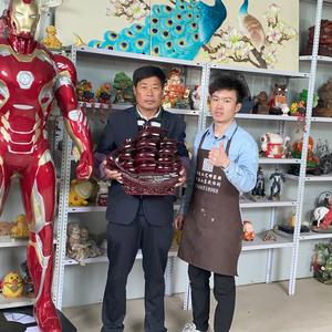 树脂工艺品王百亿头像